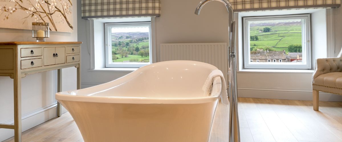 The Ivelet bedroom has a free-standing bath to enjoy whilst you stay with us